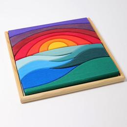 Puzzle peisaj cu apa si soare