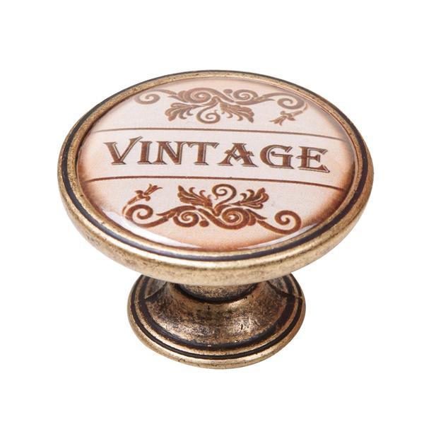 Buton pentru mobila, Vintage 550BR27, finisaj alama antichizata, D:37 mm - Maxdeco