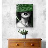 tablou-canvas-arta-moderna-femeie-ascunsa-sub-frunza-mare-tropicala-60-x-40-cm-2.jpg