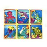 Set din lemn cu 6 puzzle incorporate - Animale marine, 7Toys